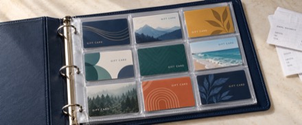 A nine-pocket binder sheet filled with gift cards